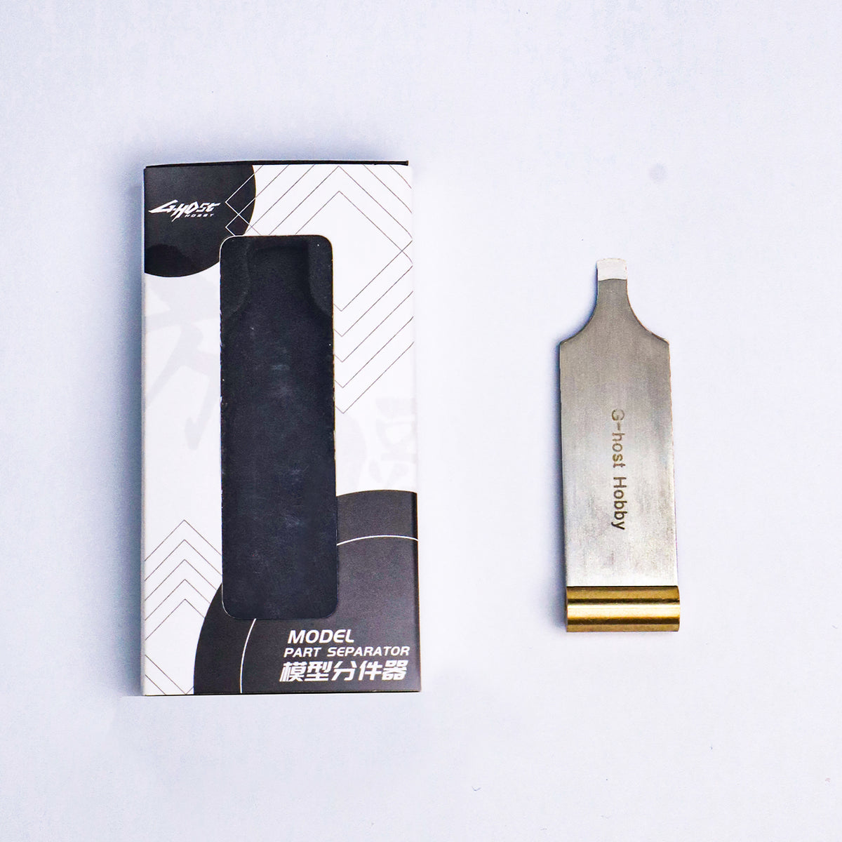 G-Host Parts Separator Set — narrow-tip separator beside its box